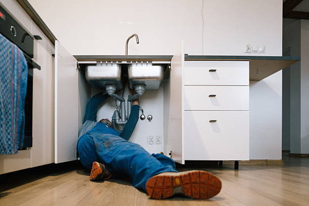 Professional Emergency Plumber technician working in Warrington, FL